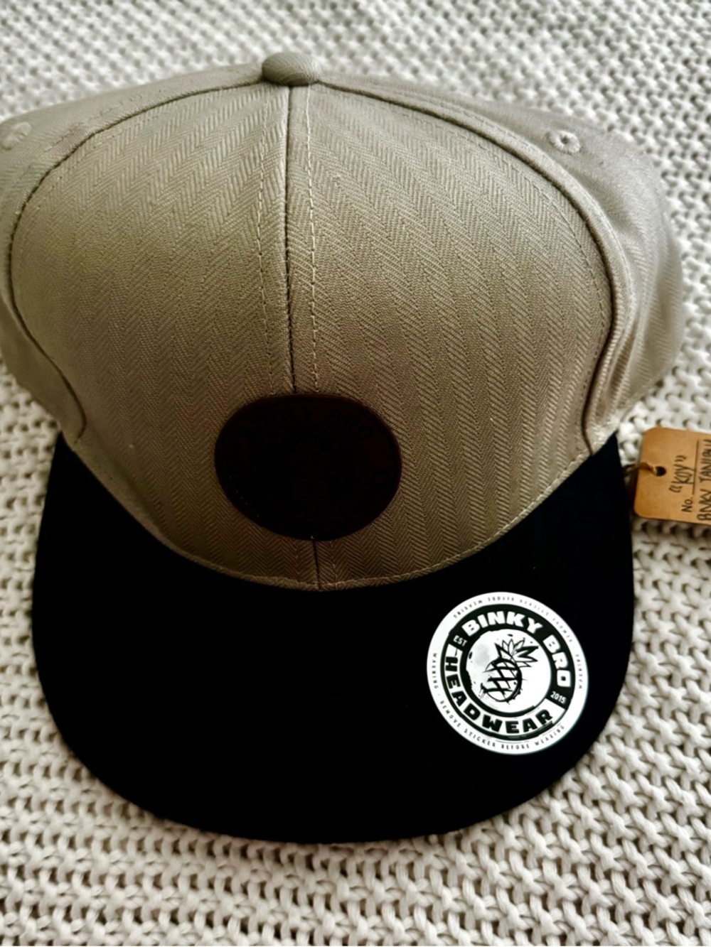 Youth Two-Tone Snapback Hat in Khaki and Navy Blue bib